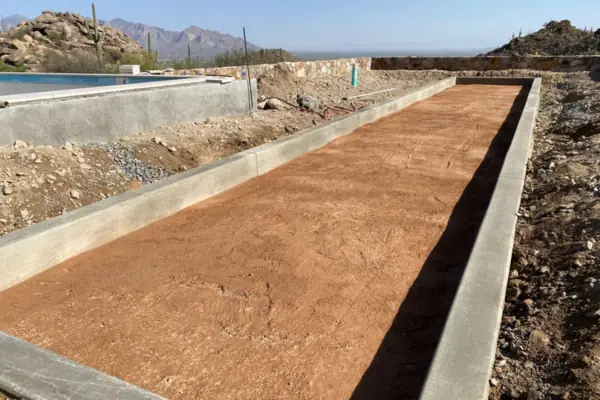 Bocce court base with concrete curbs under construction in the Tucson foothills