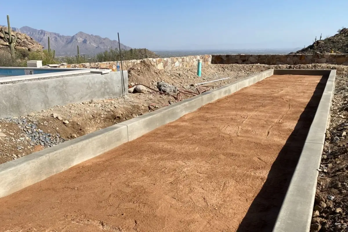 Bocce court base with concrete curbs under construction in the Tucson foothills